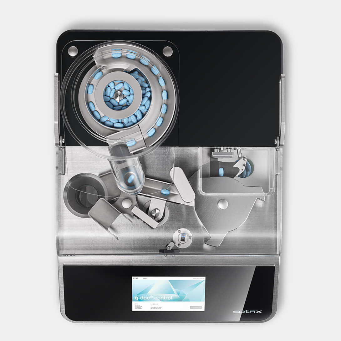 Reliable tablet form positioning is achieved with the use of an automated tablet hardness tester.